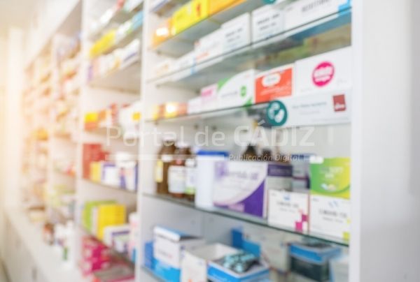 blurry view of drug store and pharmacist blurred clean pharmacy with medicine on shelves defocus t20 nrolj8