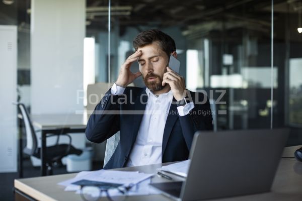 concerned male entrepreneur talking on cellphone a 2023 01 13 01 49 33 utc