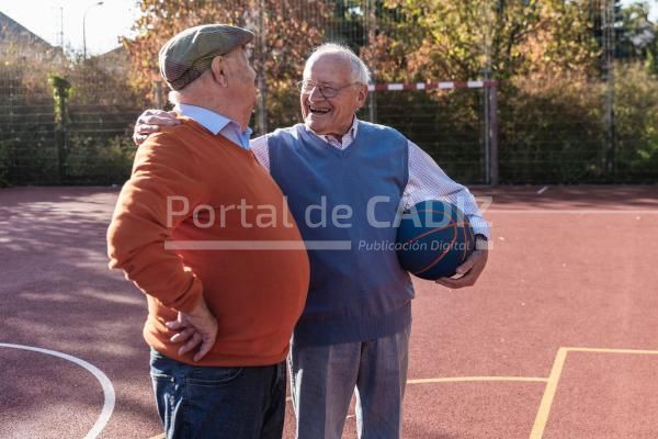 two fit seniors having fun on a basketball field 2022 12 16 22 26 49 utc