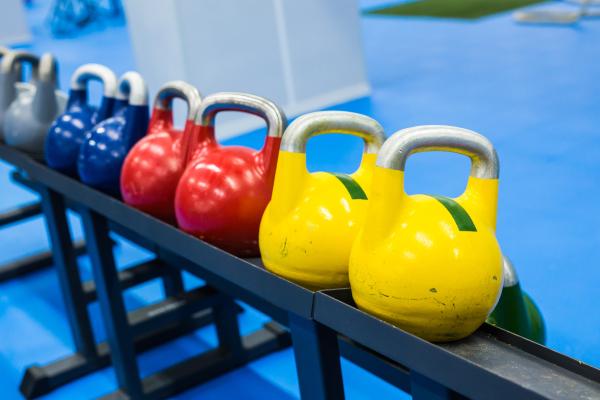 colorful kettlebells in a row in a gym focus on 2021 08 28 07 47 14 utc