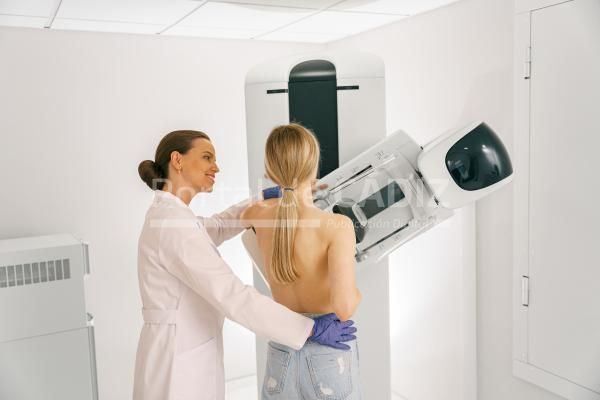 female doctor prepairing woman before doing mammog 2023 09 06 01 53 54 utc