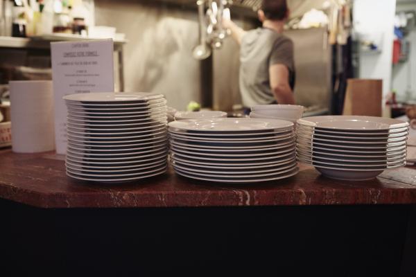plates stacked on counter in restaurant restauran 2022 03 07 23 56 11 utc